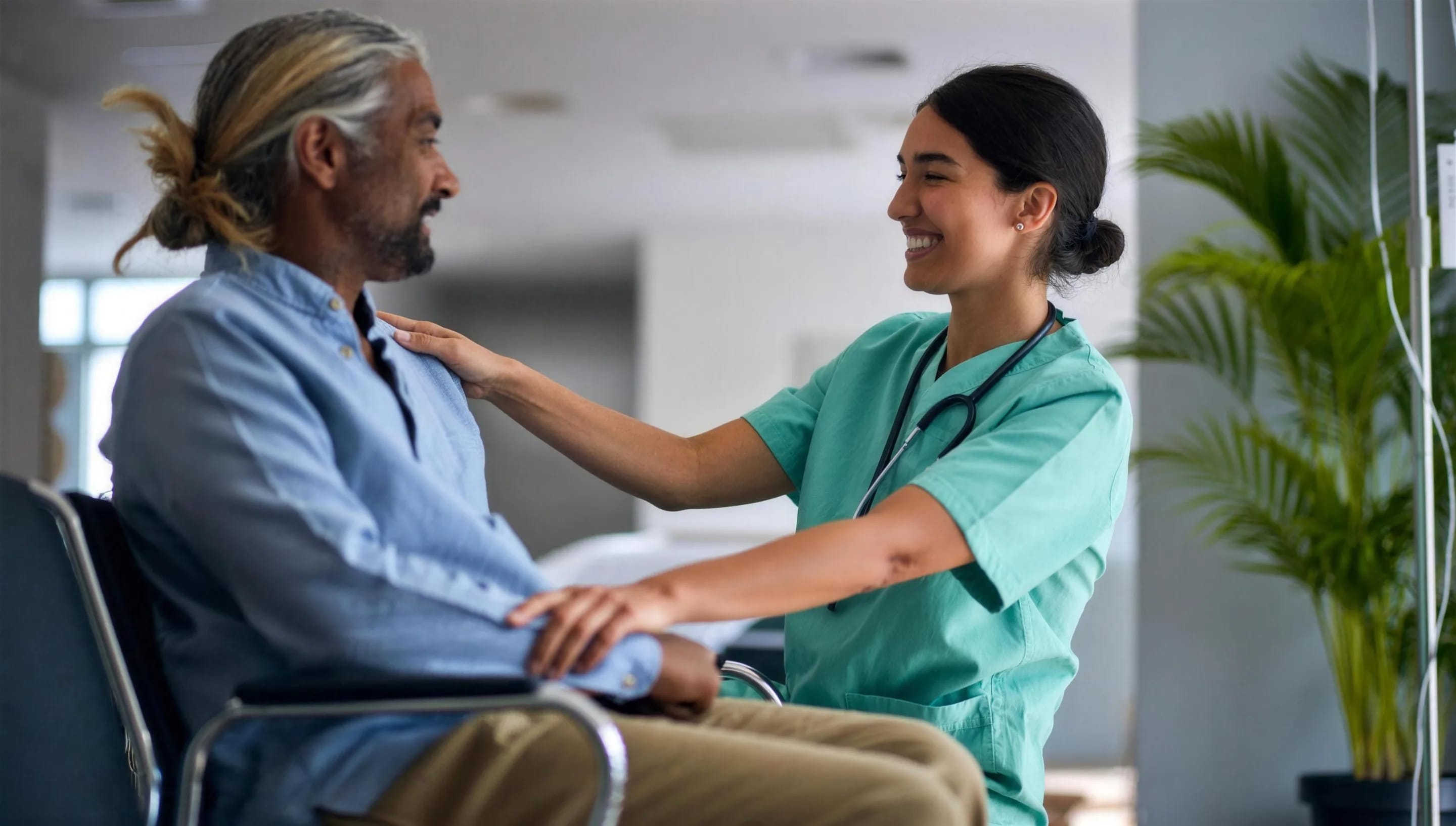 A nurse comforting a patient, hand on shoulder