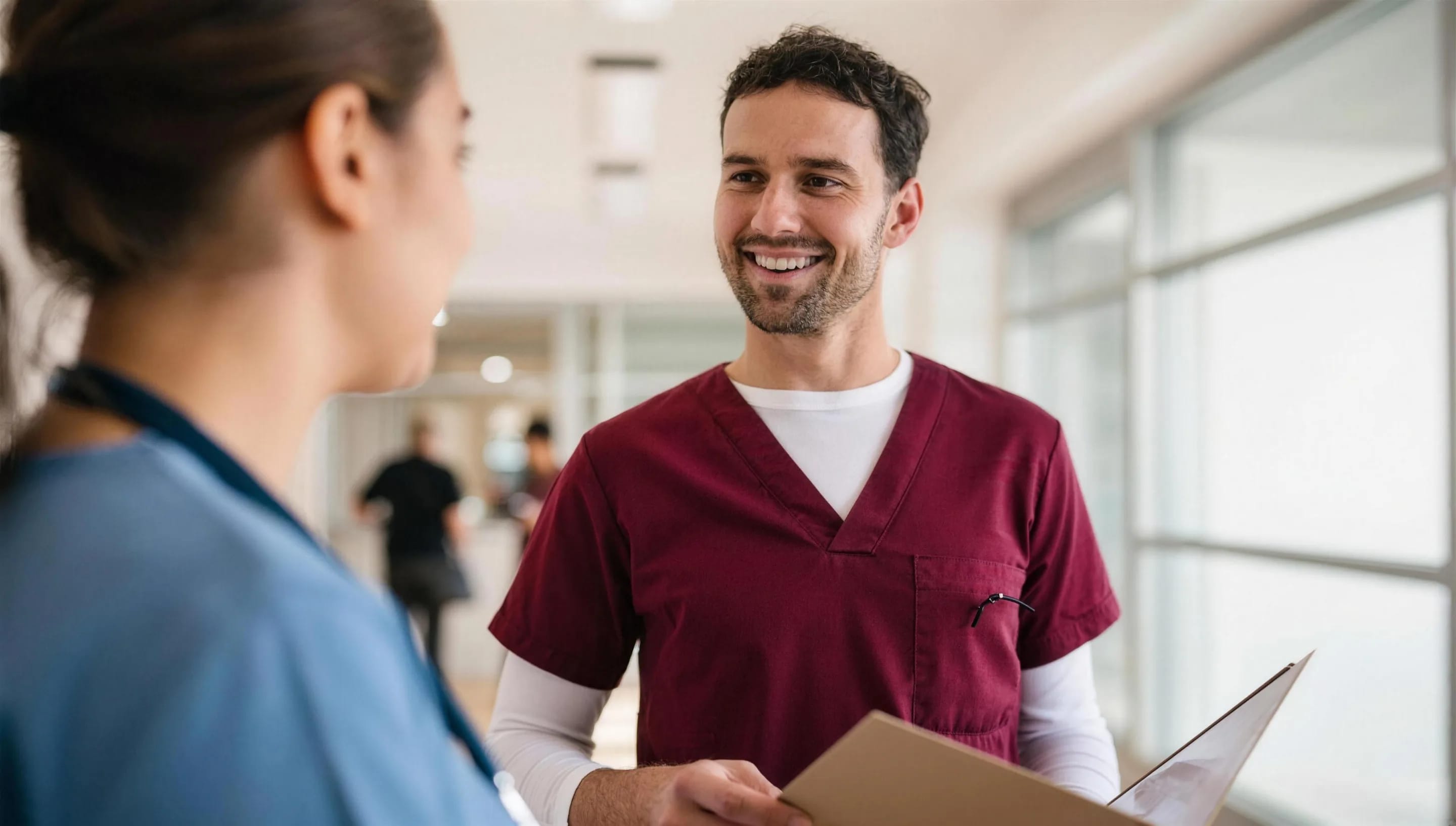 A nurse talking with a colleague